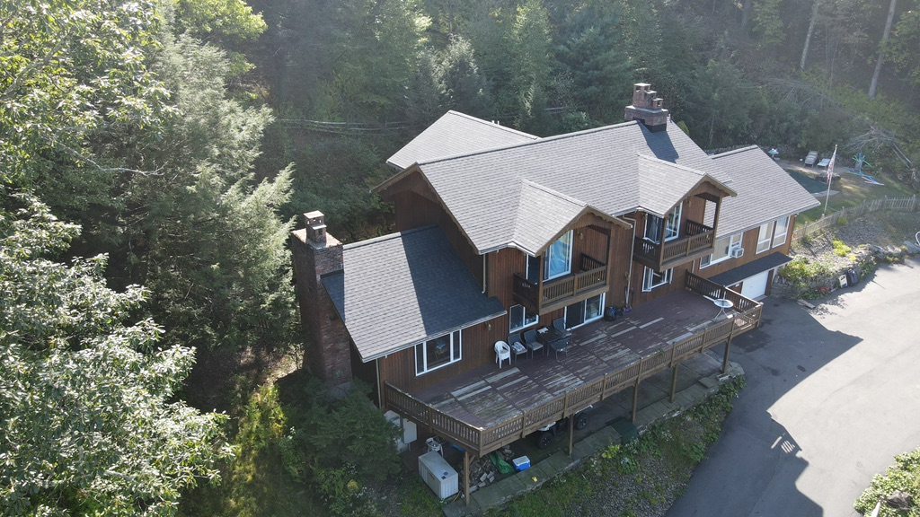 ShingleMe roofing crew installing a new shingle roof
